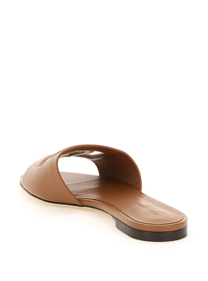 Dolce & Gabbana leather slides with cut-out logo