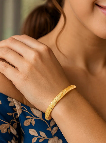 14k Yellow Gold Domed Bangle with a Weave Motif