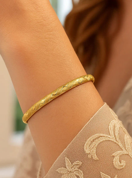 14k Yellow Gold Domed Bangle with a Weave Motif
