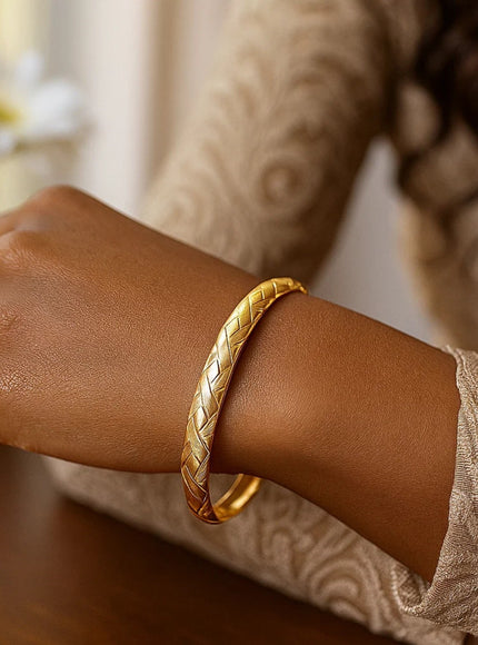 14k Yellow Gold Domed Bangle with a Weave Motif