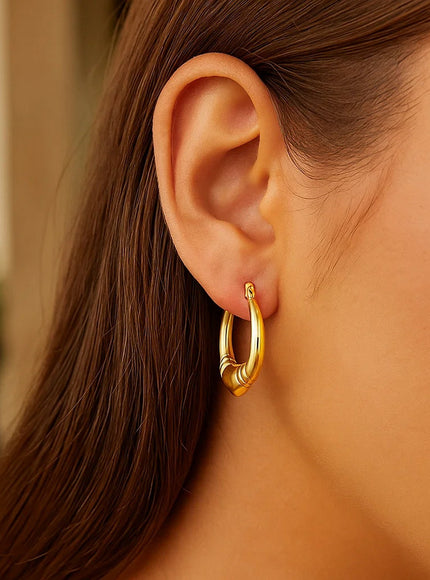 Medium Heart Hoop Earrings in 14K Yellow Gold