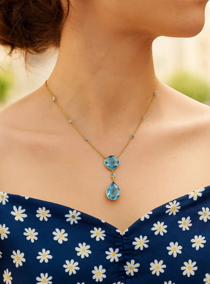 14k Yellow Gold Necklace with Pear-Shaped and Cushion Blue Topaz Briolettes