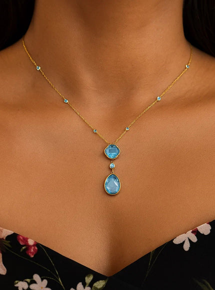 14k Yellow Gold Necklace with Pear-Shaped and Cushion Blue Topaz Briolettes
