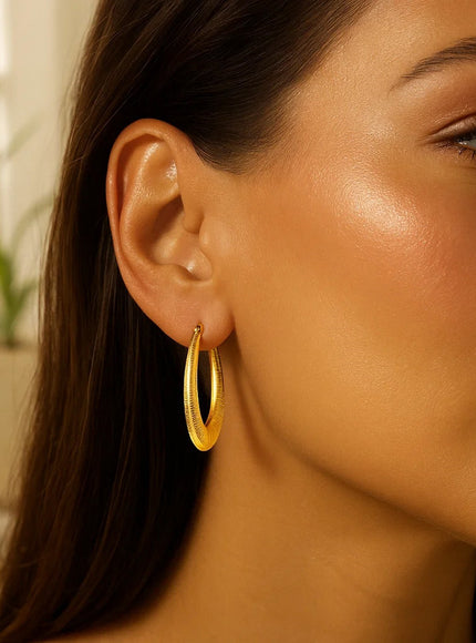 14k Yellow Gold Hoop Earrings in a Graduated Texture Style