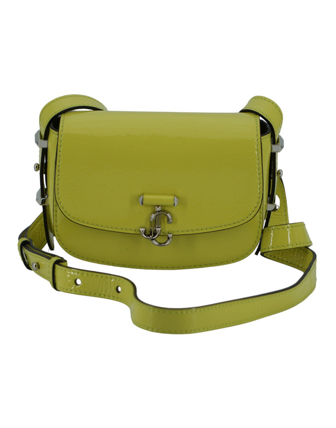 a yellow cross body bag on a white background