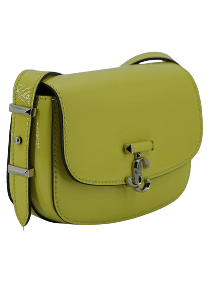 a small yellow bag with a metal handle