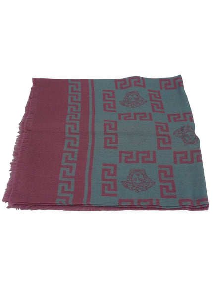 a pink and blue scarf with a design on it