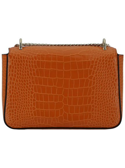 an orange handbag with a metal handle