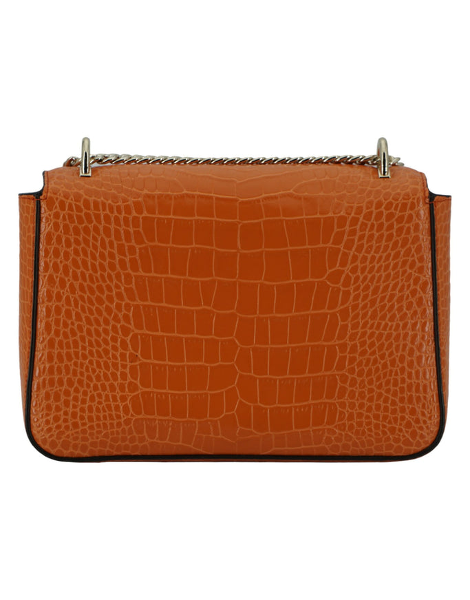 an orange handbag with a metal handle