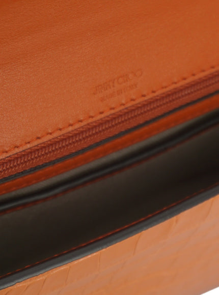 a close up of a brown and black case