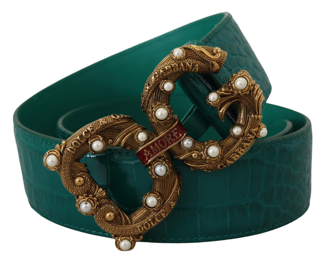 a green belt with pearls and a gold buckle