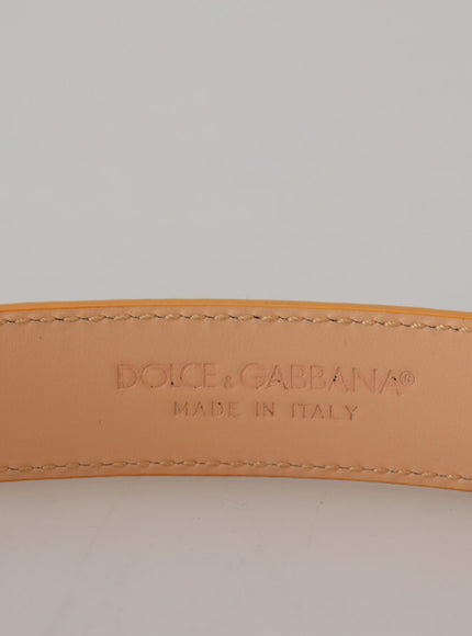 a close up of a tan leather belt