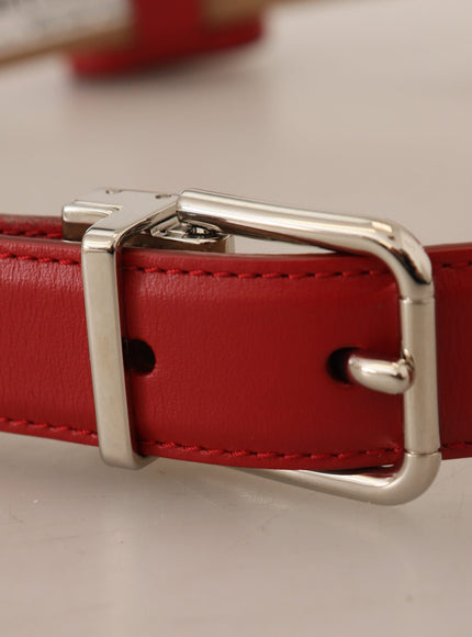 a close up of a red belt on a table