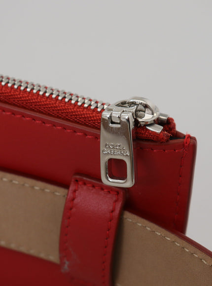 a close up of a red purse with a zipper