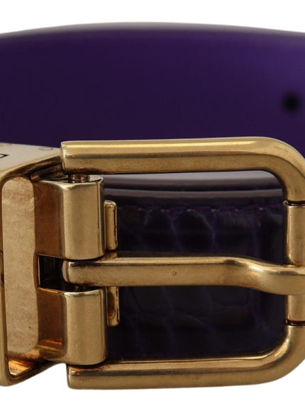 a purple belt with a gold buckle