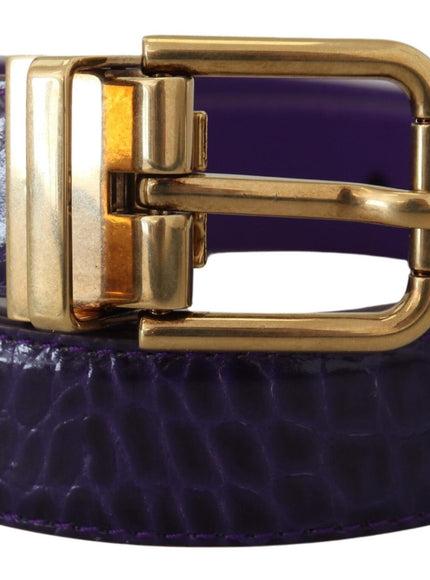 a purple belt with a gold buckle