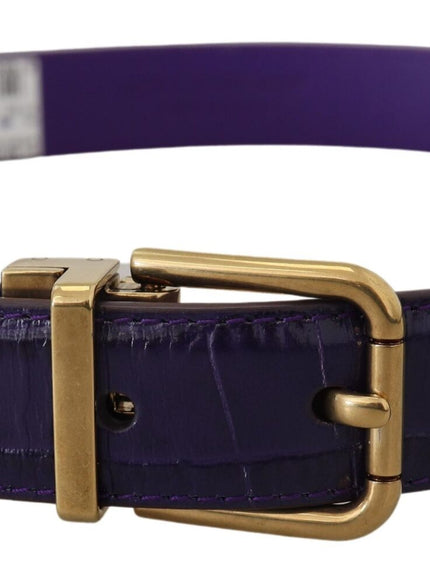 a purple belt with a gold buckle