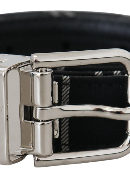 a black belt with a silver buckle