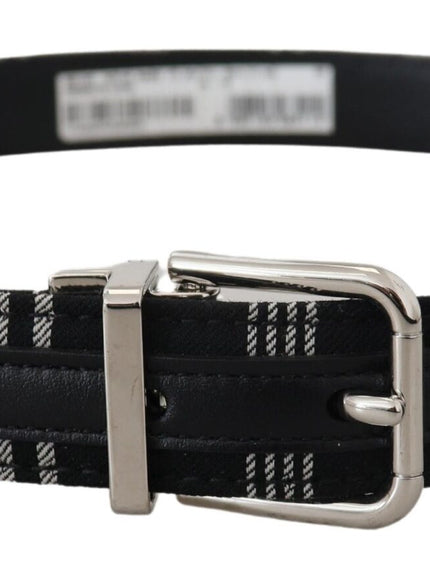 a black and white plaid belt with a metal buckle