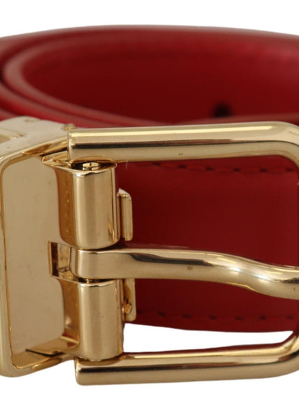 a red leather belt with a gold buckle