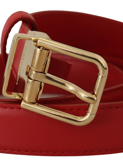 a red leather belt with a gold buckle