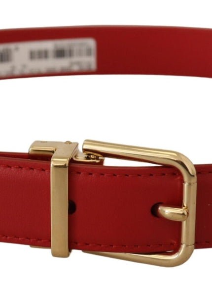 a red leather belt with a gold buckle