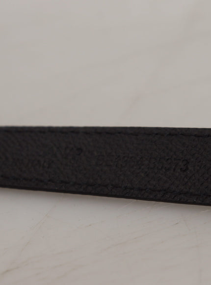 a close up of a black belt on a table