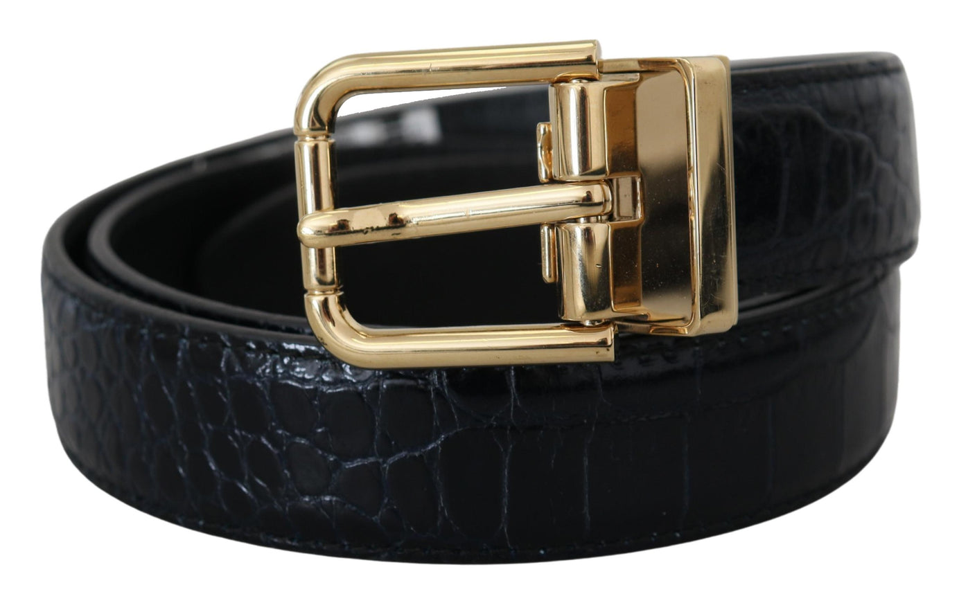 a black leather belt with a gold buckle