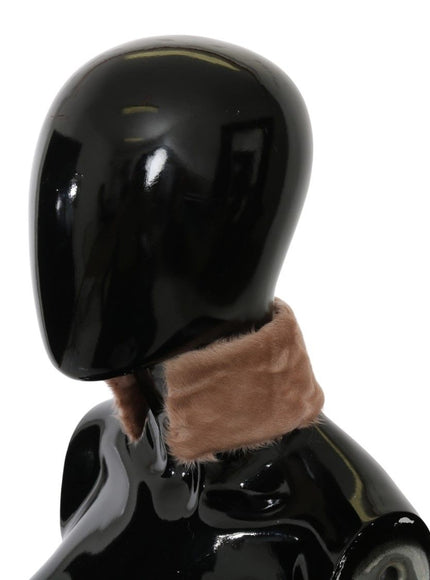 a black mannequin with a fur collar