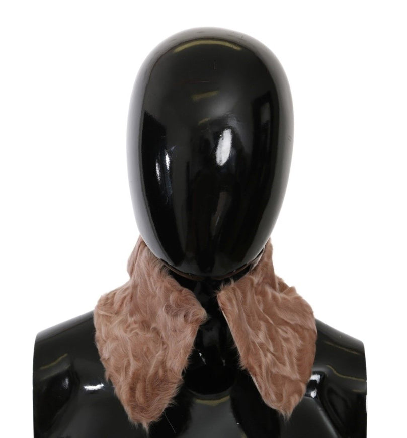 a black mannequin with a brown scarf on it