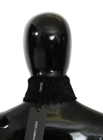 a black mannequin with a tag on it