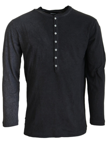 a black shirt with buttons on the chest