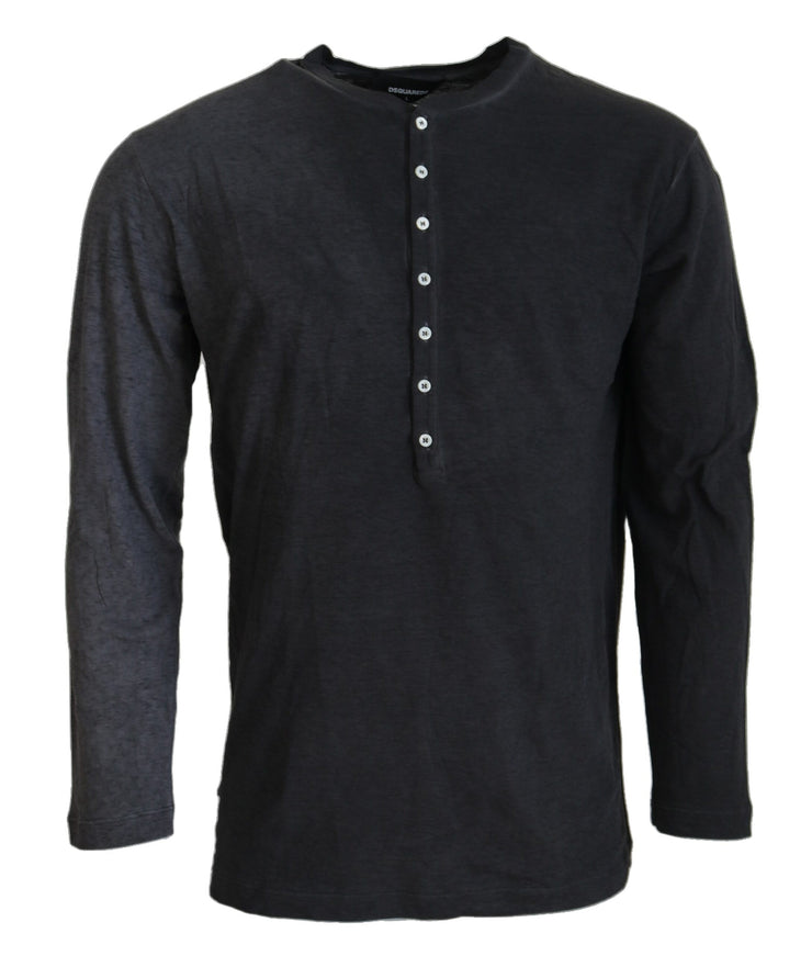 a black shirt with buttons on the chest