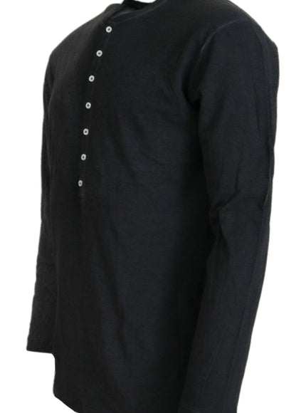 a black shirt with buttons on the chest