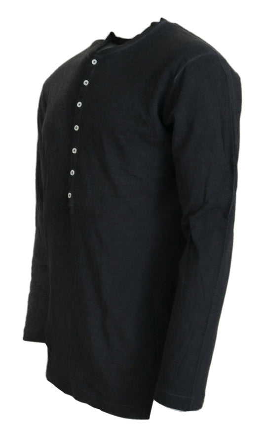 a black shirt with buttons on the chest