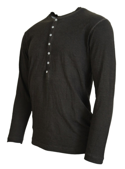 a black shirt with buttons on the chest