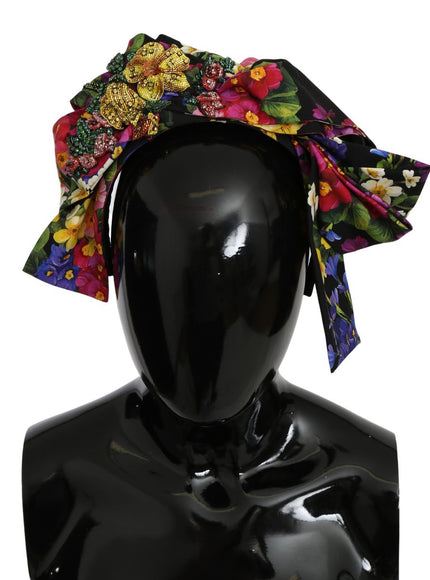 a black mannequin head with a multicolored floral print on it