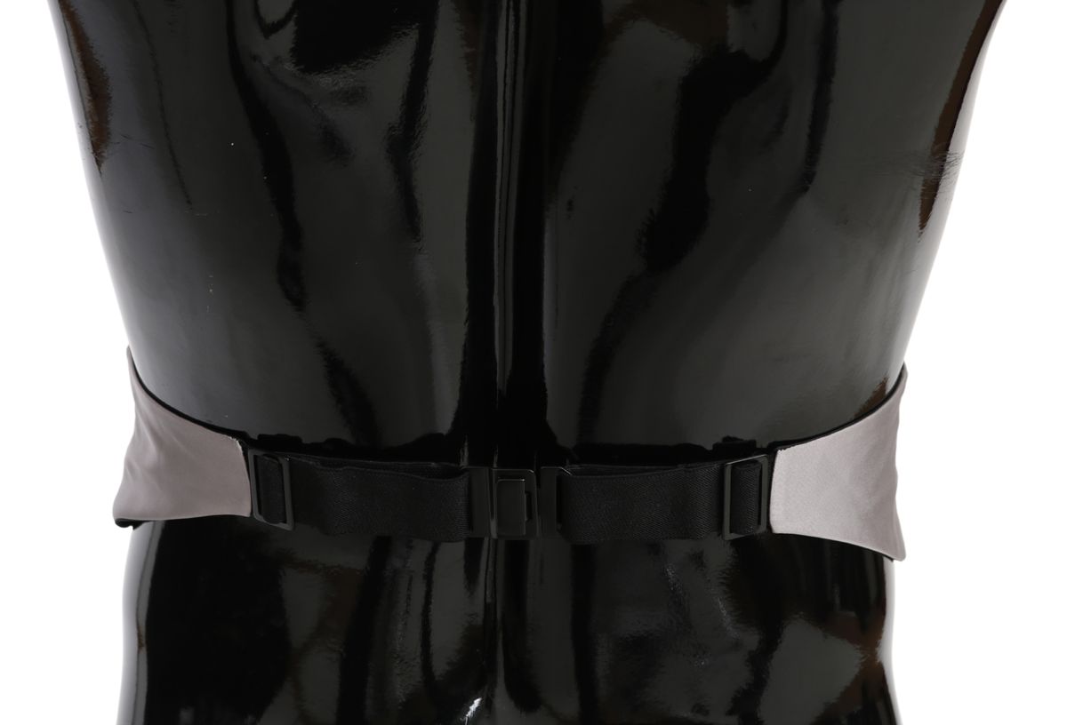 a close up of a person's black boots