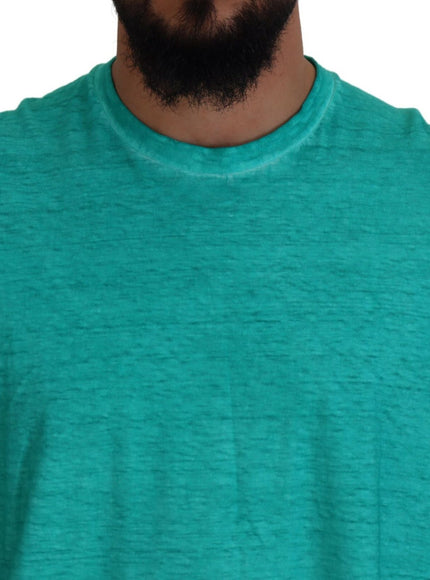 a man with a beard wearing a green shirt