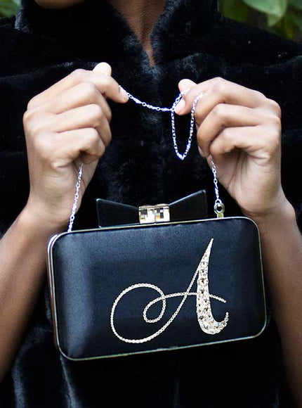 Joy Crystal Initial Bow Clutch