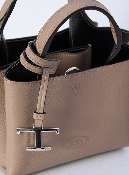 a purse with a cross on the front of it