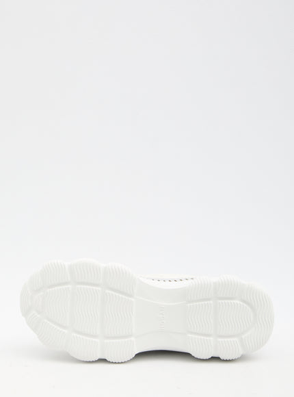 a close up of a white shoe on a white background