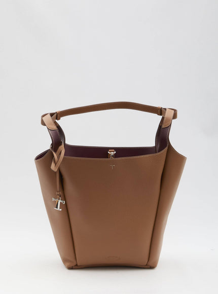 a brown handbag with a handle on a white background