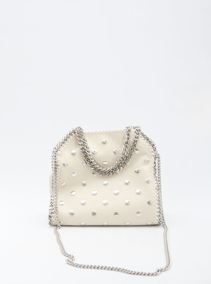 a white purse with a chain strap