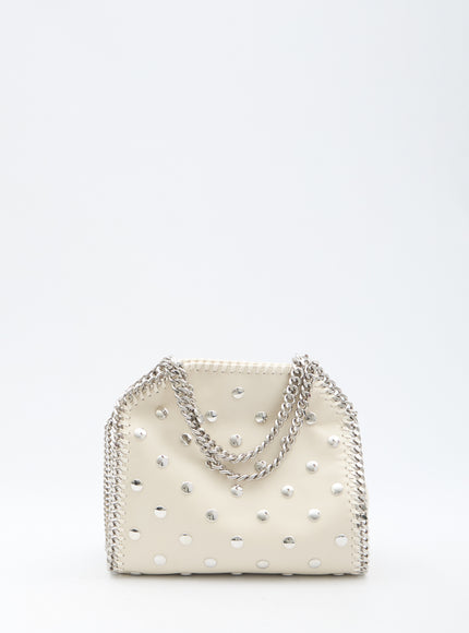 a white purse with a chain strap