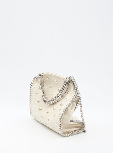 a white purse with a chain strap