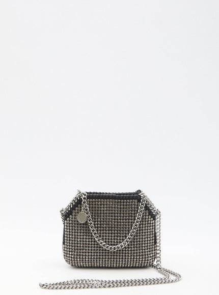 a black and white purse with a chain strap