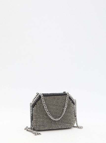 a black and white purse with a chain