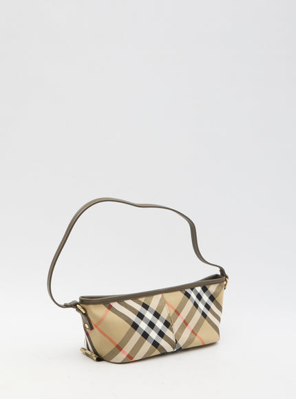 a small purse with a check pattern on it