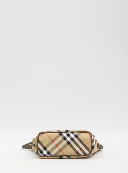 a burber check belt bag on a white background